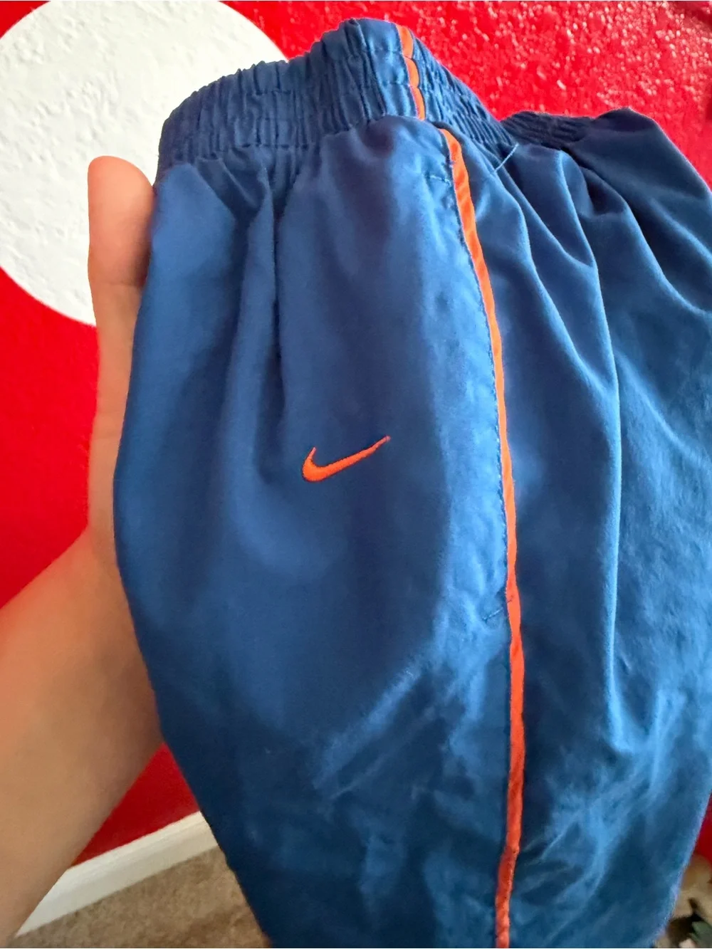 Vintage Nike Kids Blue Track Pants with Orange Trim